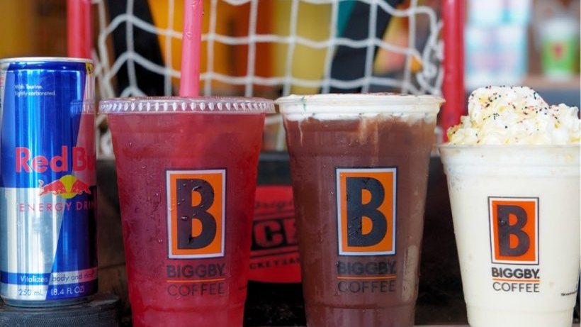 BIGGBY Coffee drinks lined up on a counter